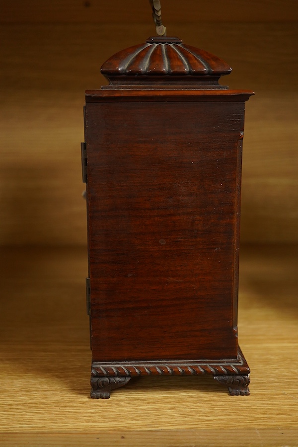 A mahogany mantel clock, retailed by J. W. Benson, c.1930, with engraved silvered dial, with key, 27cm high. Condition - good, untested